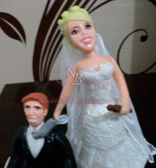 Noivos de biscuit para topo de bolo em casamento é na noivinhos de biscuit e cia.noivos de biscuit personalizados, topo de bolo para casamentos e aniversários, lembranças para casamento, aniversários, 15 anos e festas.